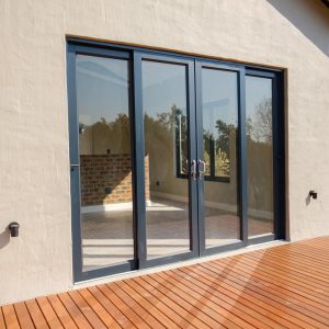 4-Panel OXXO (Dual Slide) – Patio Door Bronze